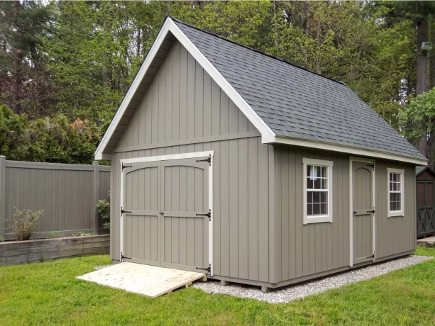 gorgeous garden shed with double garage door with compatible color with the exterior color scheme