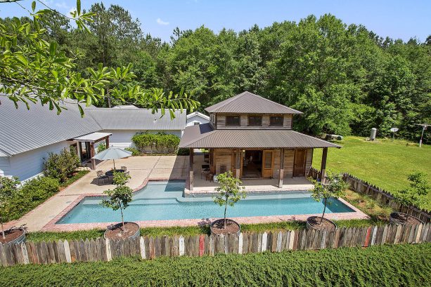 the full view of the residence, the pool, and the patio