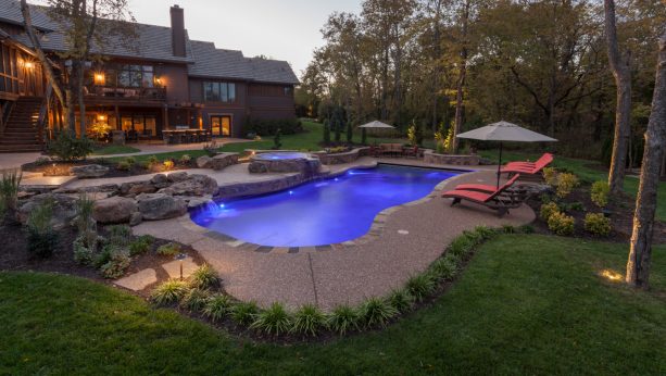 the same exposed aggregate floor also surrounds the pool together with some other flooring materials