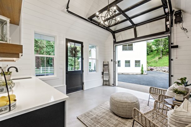 the space-friendly sectional garage door seen from the shed interior