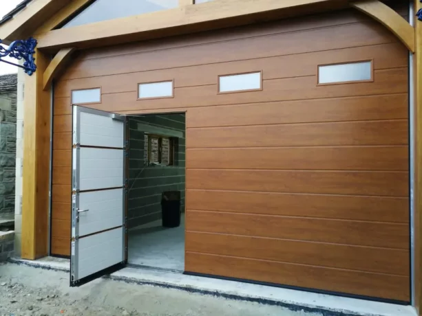 a sectional garage door with a wicket for easier man entrance