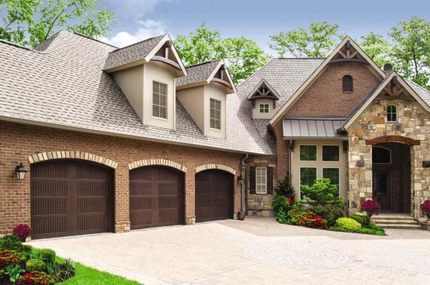 fiberglass-surface garage door looking like wood in a craftsman house