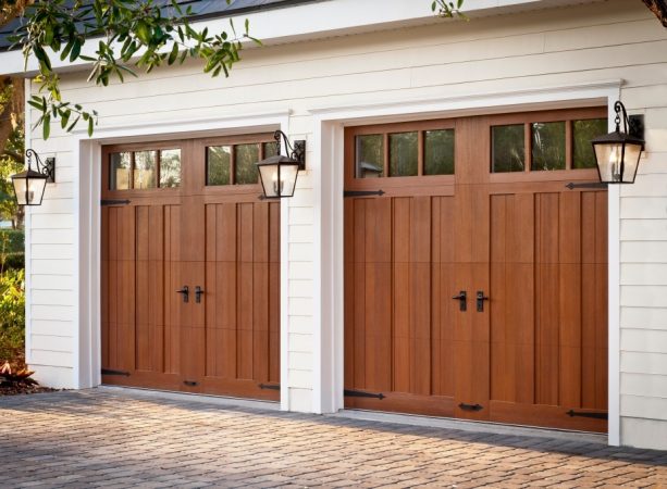 steel garage doors obtain the wood look from mahogany cladding and overlays