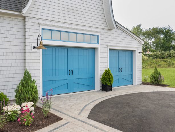 the blue, beach-style garage doors seems like these are made from genuine wood
