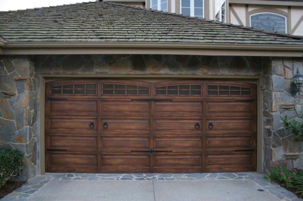 the realistic wood look the garage door obtained after the makeover