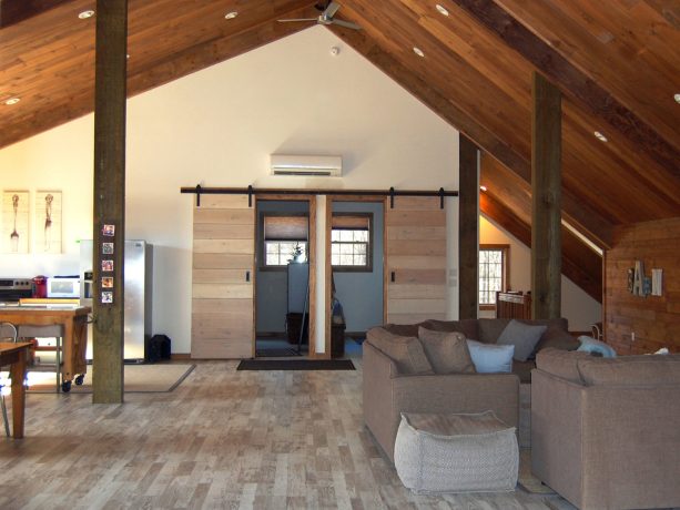 the open-style second floor connecting kitchen, living, and dining room together