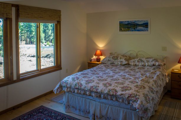 the simple yet comfortable bedroom in the RV garage building