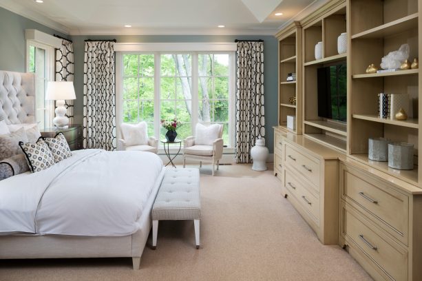 the beige carpet flooring in the bedroom area
