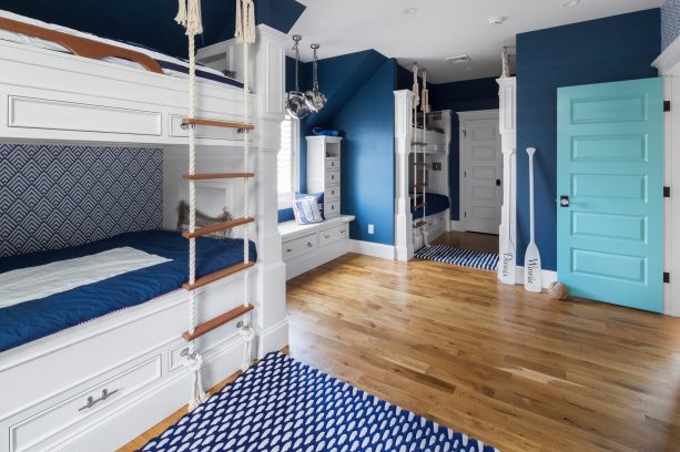 the wood floor is also used in the shared-kids’ bedroom