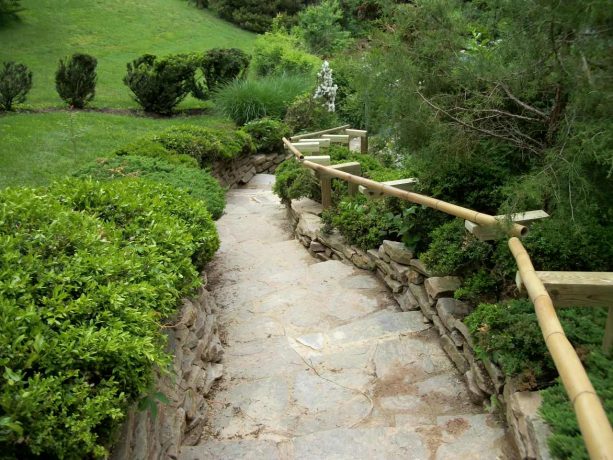 bamboo railing as an excellent choice for a stairway in an Asian landscape design