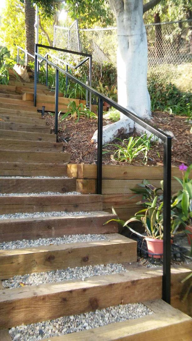 square tube steel handrail looks simple but provide enough safety value for the contemporary staircase