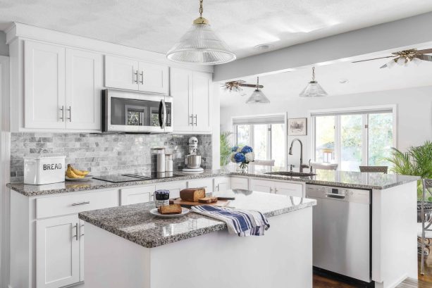 after the refacing, the cabinet design is dominated in white and get a new recessed panel doors and drawers