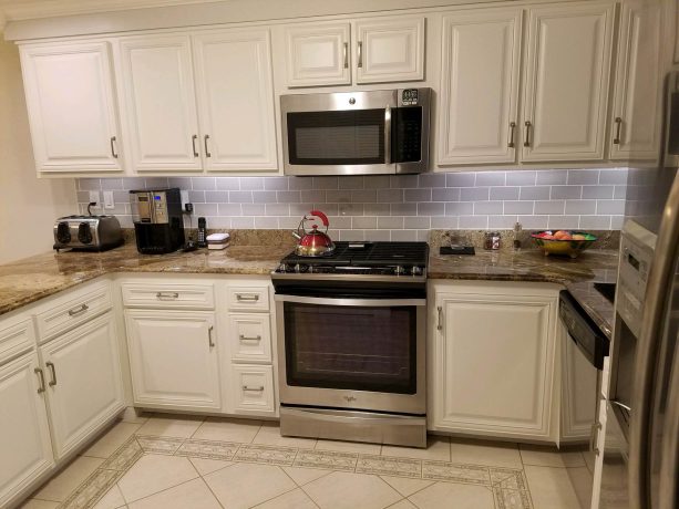 after reface - everything is the same in the kitchen except for the refaced cabinets