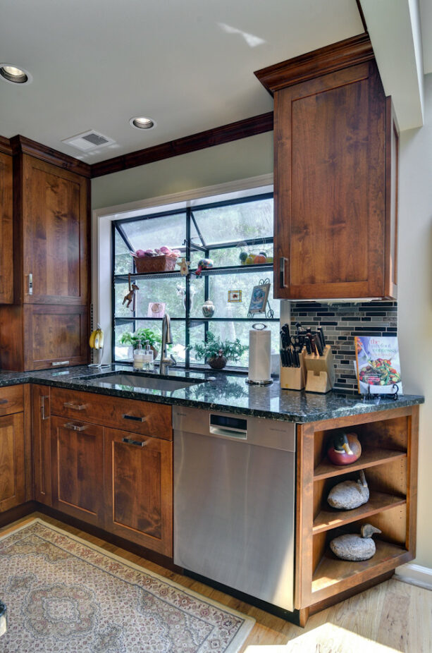 a glass garden window comes with metal frame and shelves for the potted plants