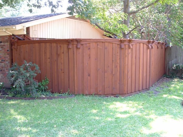 arched, decorative cap to make board on board fencing looks more attractive