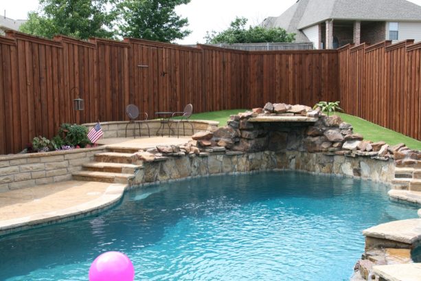 board on board privacy fence to cover a swimming pool area