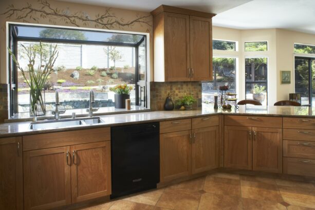 oversized glass garden window in a Mediterranean kitchen interior