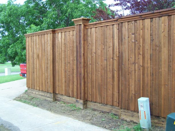 the attractive column with cap feature in a board on board fence design