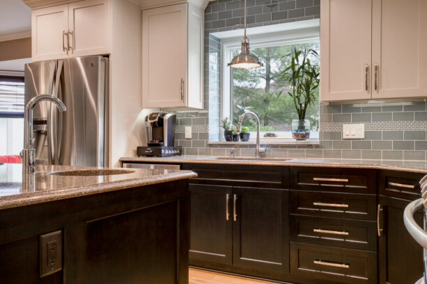 white garden window and grey subway tile backsplash paired together in a contemporary kitchen