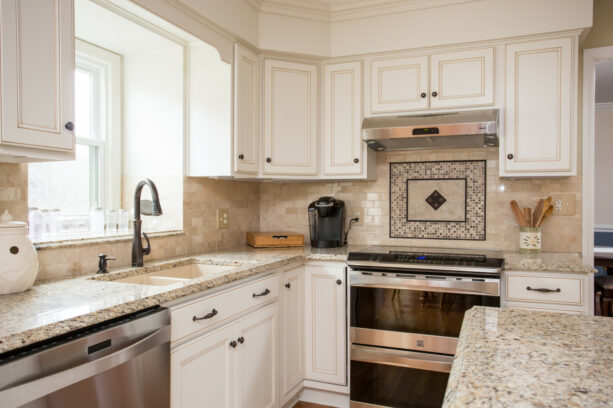 how the garden window and sink look in the transitional kitchen interior