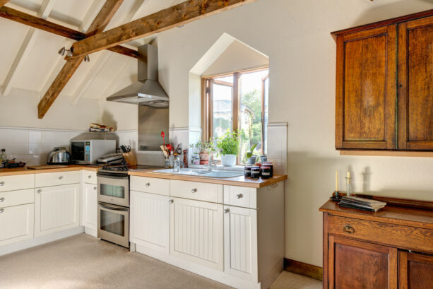 kitchen garden window with double opening located over a drop in sink