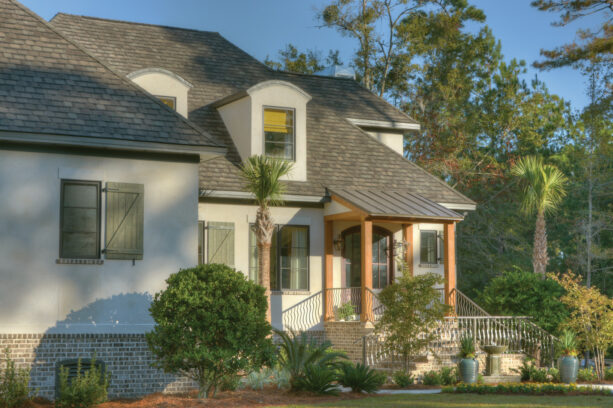 a portico looks accentuating because of the burnished slate metal roofing