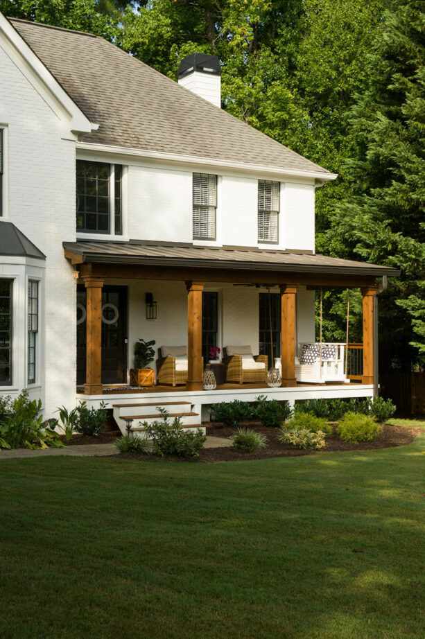 a transitional porch with metal roof in burnished slate color