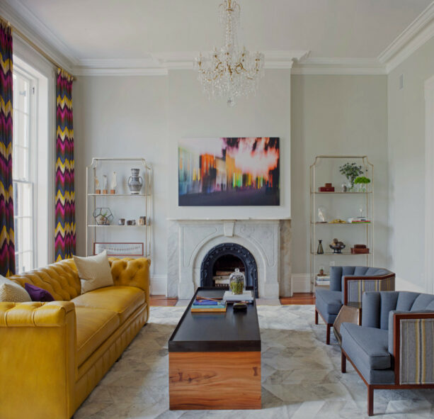 a contemporary living room with Gray Owl walls and mustard yellow sofa