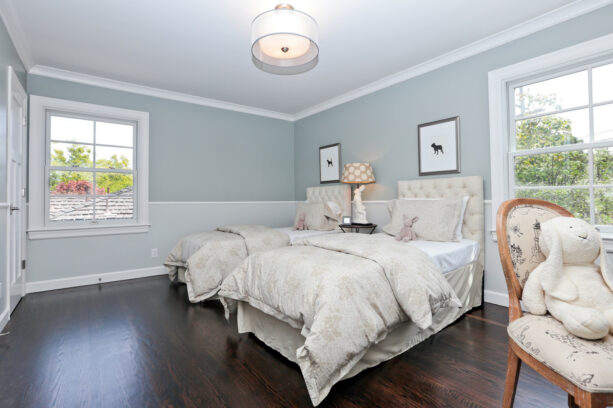 a transitional bedroom looks soothing with the pairing between Gray Owl and Sea Haze for the walls