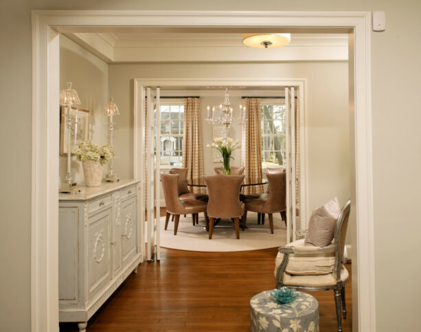 open entryway and dining room with Gray Owl walls and brown elegant brown chairs